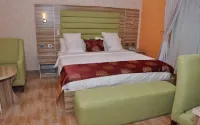 Mozida Suites Отели в г. 