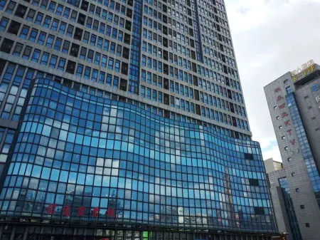 Rainbow Apartment Отели в г. Чжаоюань