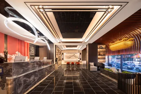 Dalian Puti Hotel Отели рядом с достопримечательностью «Dalian Forest Zoo»