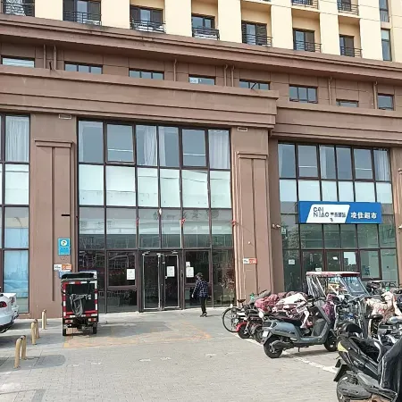 Kaisheng Homestay (Langfang Railway Station Wanda Plaza)