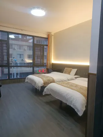 Blue Beauty Business Hotel Отели в г. Цзиюань