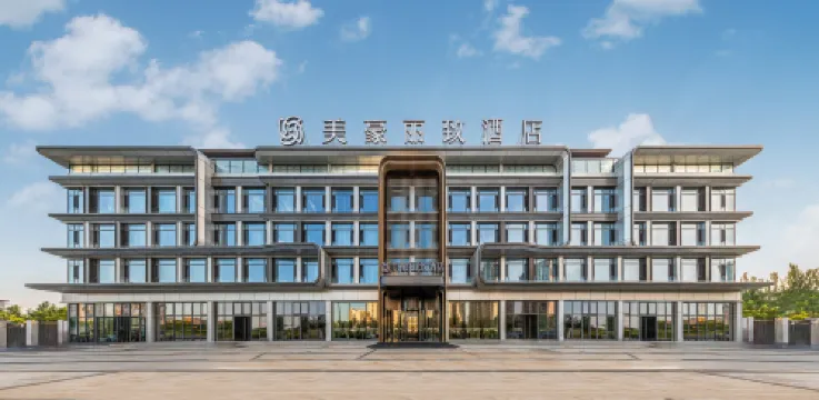 Meihao Ritz Hotel (Datong South Station Fangte Store)