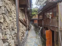 LotsRainInn.MountainDweIIing...XijiangQianhuMiaoViIIageMuseumBranch