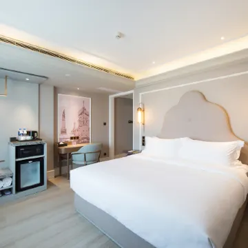 Mercure Harbin Hexing Road Linda Hotel Отели рядом с достопримечательностью «Колледж Jiangnan-Библиотека Университета Мастера Харбина»