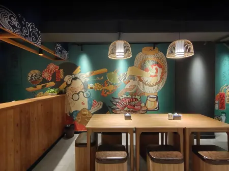 WM Tea Art Hotel Отели рядом с достопримечательностью «Tieshan Square»