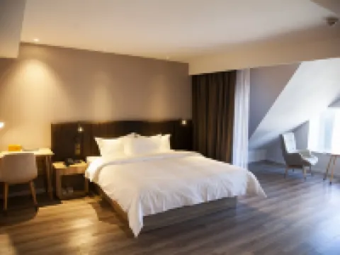 Dengfeng Youjia Hotel (Dengfeng Bus Terminal) โรงแรมในเติงเฟิง