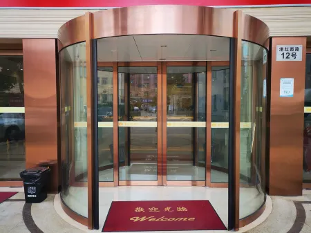 Vienna Hotel (Shanghai Pudong Airport Nanzhu Road) Отели рядом с достопримечательностью «Shanghai Industry and Commerce Foreign Language College South Campus»