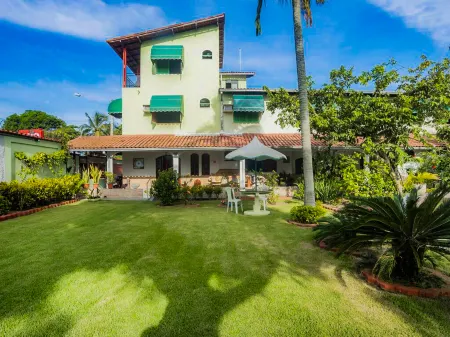 Voa Pousada Dos Jasmins Отели в г. Manguinhos