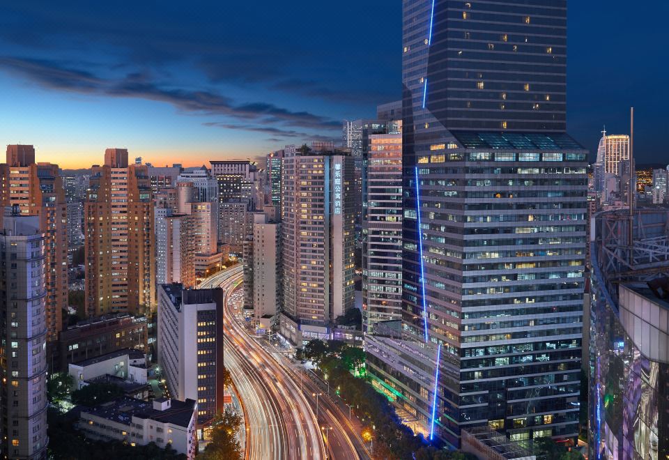 시타딘 레지던스 호텔 상하이 옌안시루의 세련된 침실