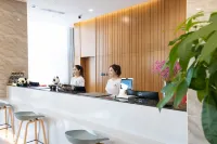 Latitude World Hotel (Laixi Jiangshan Toll Gate) Hôtels à : Laixi