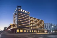 Xingyue Hotel (Dashang New Mart Jiamusi Station) - 4 estrellas