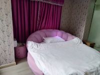 OYO安康紫荆园宾馆 - 优雅圆床房