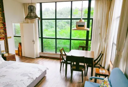 Jiuzhen Inn Отели рядом с достопримечательностью «Jiuzhen Forest Park»