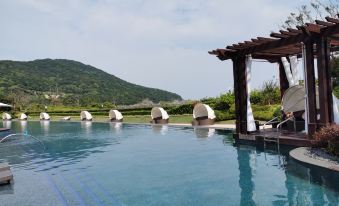 Zhoushan Fengqingyundan Scenic Apartment Hotel