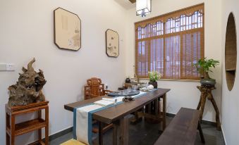 Floral Hotel · Wuyuan River Embankment B&B Hotel (County Center Business District Store)
