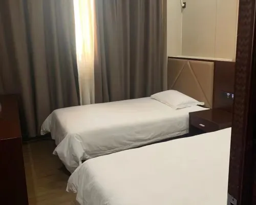 Hua Sheng Hotel Rooms Photos