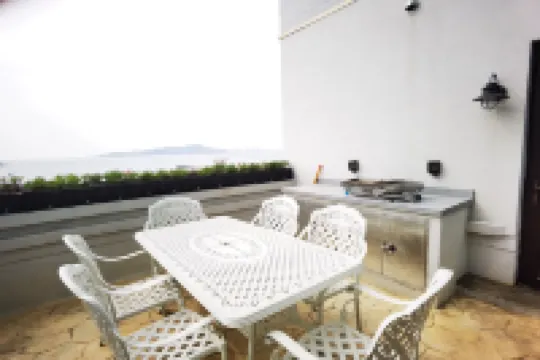 銘宿全海景民宿（青島火車站棧橋店）