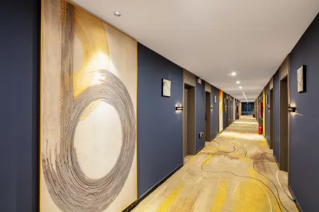 Xihua Yushe Hotel Apartment Отели рядом с достопримечательностью «Jizi Reading Platform»