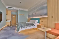 Gushi Hotel (Baolong Building 3)