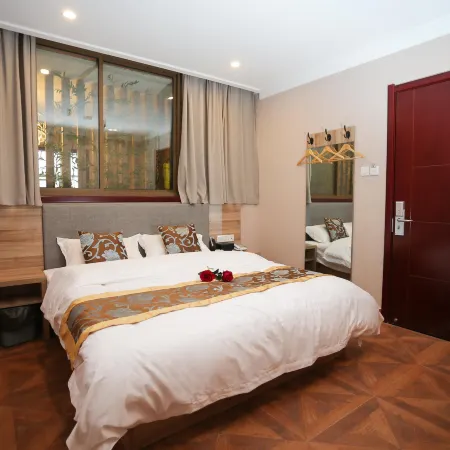 Donghui Business Hotel (Feixi Taohua Town Government Baida Outlet Living Plaza)