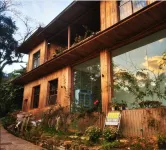 Lancang Yuercha Chinese Inn (Jingmaishan Ancient Tea Forest Scenic Area)