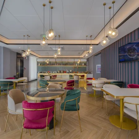 Magnotel Hotel (Huludao Passenger Terminal) Отели в г. Хулудао