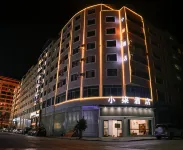 Zhaotong Xiaoqi Hotel (Jinhai Building Materials Home City)