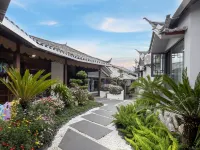 Oriental Garden Inn (Lijiang Old Town Watermill) Hotel dekat Jalan Square
