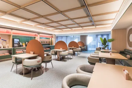 Orange Hotel (Shanghai Luoyang Road Outer Ring Road Subway Station) Отели рядом с достопримечательностью «Nanfang Xiuxian Guangchang Taiwan Fengqing Street»