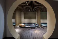 沐居·湯泉飯店（峨眉山高鐵站報國寺店） - 溫泉