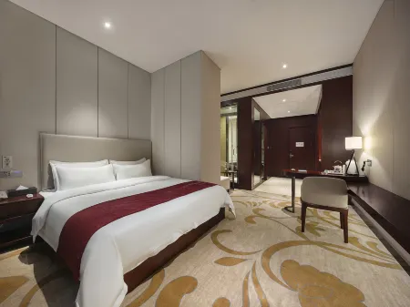 QIANNA HOTEL JOURNEY(Zhengzhou East Station Zhengdong MixC Mall) Отели рядом с достопримечательностью «Henan Agricultural University (Longzihu Campus)»