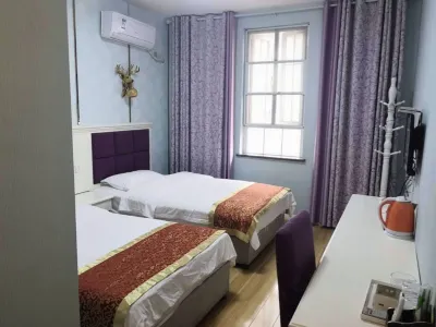 Pengzhou Xinyi Hotel