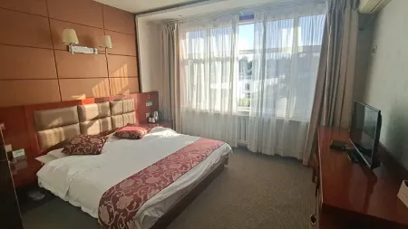 Uxin Banner Caoyuan Xinyang Hotel