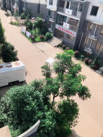 Shiguang Homestay Отели рядом с достопримечательностью «Mulan Grassland»