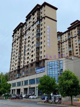 Blue Time Hotel Wuchuan Отели в г. Вучуань