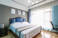 Dalian Yihe Zhixing Holiday Apartment - مطابخ