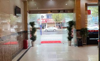 Xinmingzheng Business Hotel