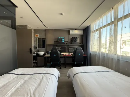 Gemeng Esports Hotel (Zhangjiagang High speed Railway Station Tangqiao Branch) Отели рядом с достопримечательностью «Tianzhuang Ancient Street»