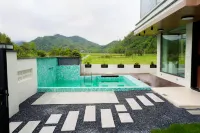 Yaoshan Xu · Natural Qixin | Minimalist Modern Qingning Boutique Stay - Beach