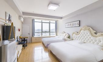 Tuyuan Holiday Apartment (Weihai Railway Station Hanlefang West Street)