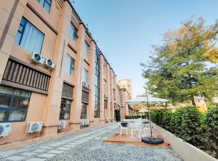 Muqi Hotel (Panzhihua South Railway Station Branch) Отели рядом с достопримечательностью «Datian Convention Relic Site»