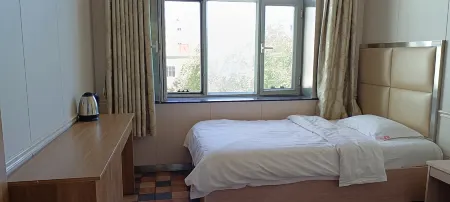 New Sida Hotel Отели рядом с достопримечательностью «Qinggeli Wolf Mountain Scenic Area»