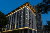 Jianguo Puyin Hotel (Xi'an Big Wild Goose Pagoda University of Technology  Subway Station Branch) Hotel di Xi'an