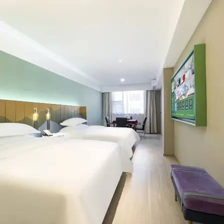 Trip.com Hotel (Xinzheng Xiasi International College Branch) Отели рядом с достопримечательностью «Народная больница Синьцзяна»