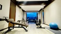 Pingcuokangsang Xuelitaohua Vacation Manor - Gym