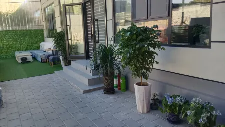 Xinyuan Muqiu Homestay Отели в г. Синьюань