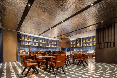 Mannsic Hotel（Deyang Guanghan） Отели рядом с достопримечательностью «Jinyan Square»