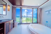 Coconut Wind Island Family Vacation Apartment (Sanya Dadonghai Half Mountain Peninsula Branch) - Condos