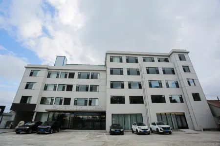 Magnolia Hotel (Yantai Penglai Railway Station) Отели рядом с достопримечательностью «Haishi Park»