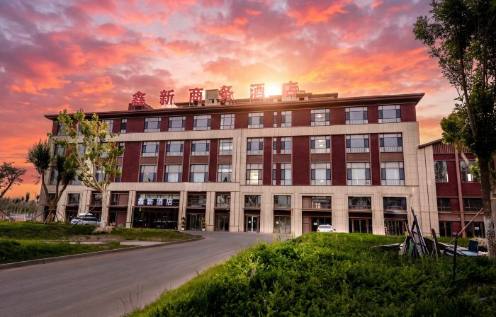 Alar Xinxin Business Hotel